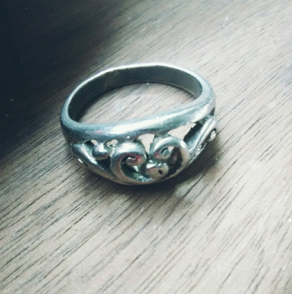 Silver twined heart ring.